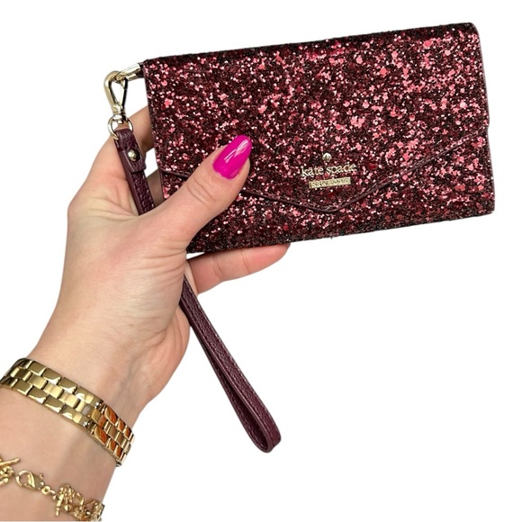 kate spade Handbags - Kate Spade Laurel Way Glitter iPhone Wristlet Wallet Deep Plum Burgundy